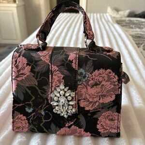 Small purse with jewel decoration